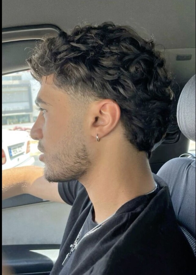 Coupe soignée taper bouclés